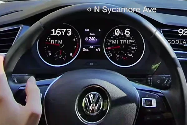 Dashboard photo showing the instrument cluster and steering wheel